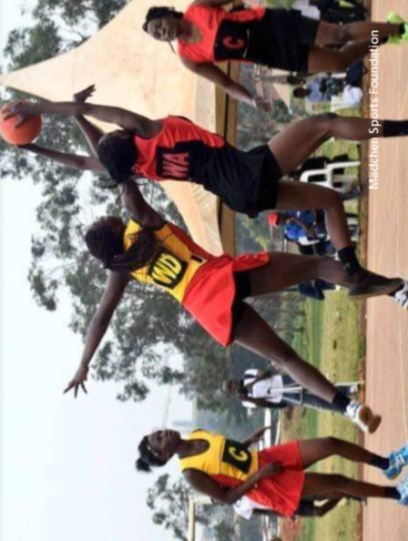 Girls playing netball during a sports match